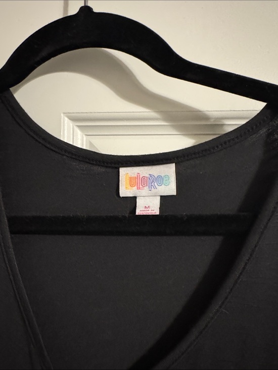 LuLaRoe Dresses & Skirts - LuLaRoe Black V-Neck Tunic dress with pockets